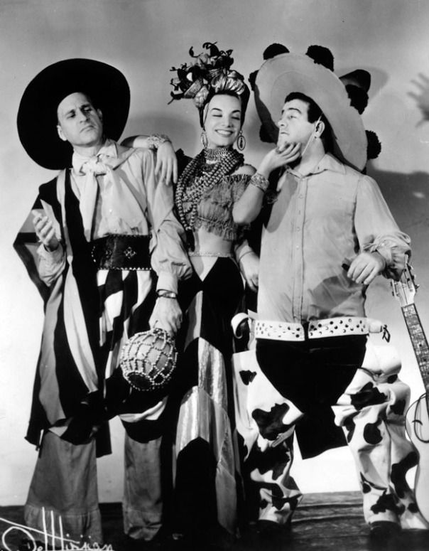 Abbott and Costello in a scene from one of their movies, with Carmen Miranda